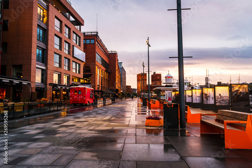 Canvas Print Downtown Oslo, Norway, on a cloudy morning, with moored boats and minimalistic s
