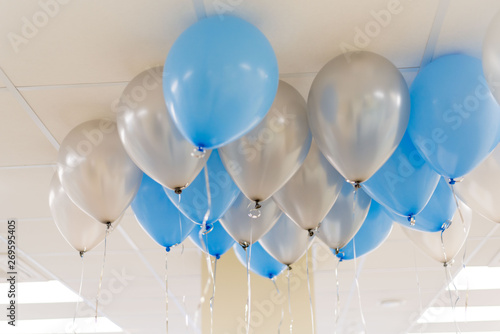 Blue and white balloons in the office. Celebraty concept. Backgound. photo