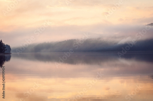 Beautiful reflections of a lake on early morning