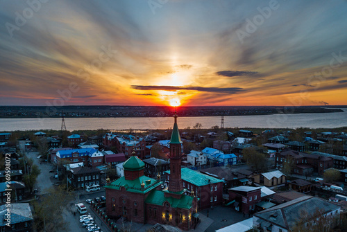 Aerial view of Tom river. Tomsk city on sunset. Siberia, Russia.