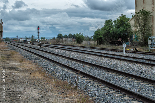 landscape withl train tracks in the station of Torrijos, province of Toledo. Castilla la Mancha. Spain