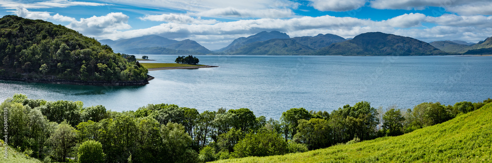 panoramic view of kentallen bay with loch linnhe and the ardnamurchan peninsula in the argyll region of the highlands of scotland on a blue spring day