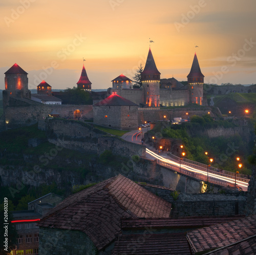 Medieval Fortress in Kamenets Podolsky, Ukraine in the late evening photo