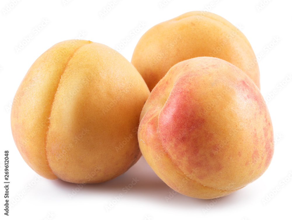 Ripe apricots isolated on the white background. Ripe apricots isolated on the white background.