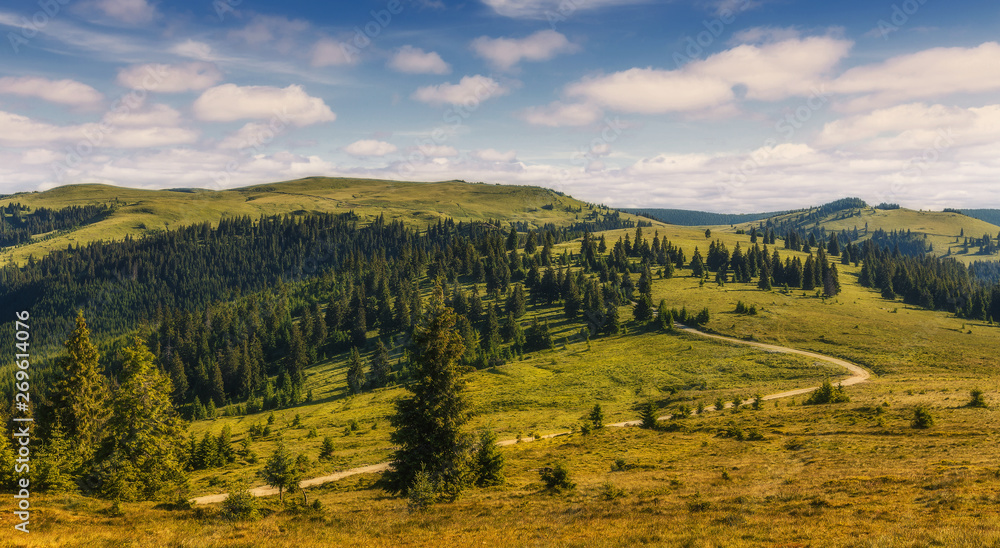 A magnificent panorama of the mountains with perfect sky. Awesome alpine highlands in sunny day. impressively beautiful Romania. Picture of wild area