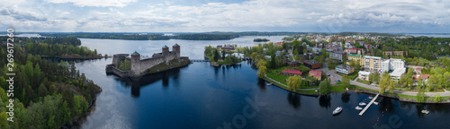 Aerial panorama of Savonlinna city at summer. Beautiful olavinlinna medieval castle. Finland.  photo