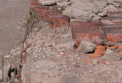 broken orange red bricks background. construction.