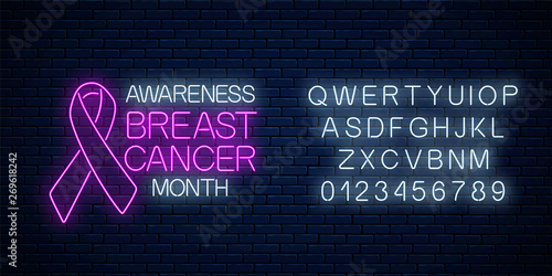 Glowing neon sign of breast canser awareness month in october with alphabet. Neon poster design with pink ribbon