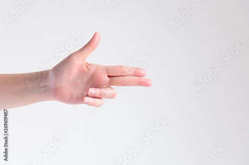 Wallpaper Mural A hand pose to be gun shape on white background. Torontodigital.ca