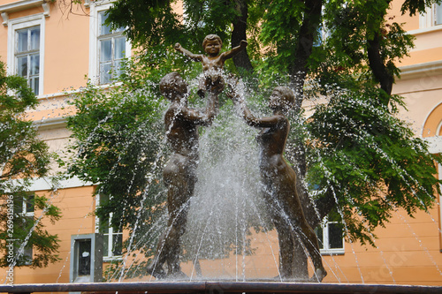 Sculpture Family, made by academic sculptor Slobodan Koji. It is placed at Kikinda's city square in Autonomous Province of Vojvodina, in Serbia photo