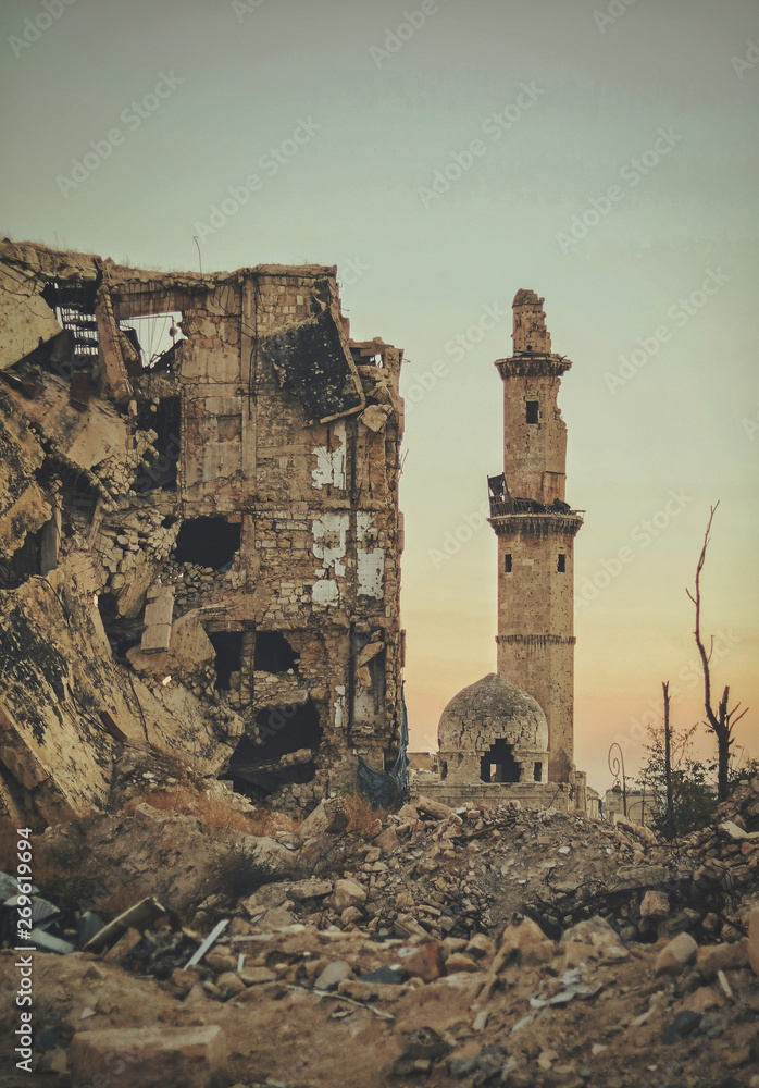 A destroyed mosque in the city of Aleppo in Syria after the war - obrazy, fototapety, plakaty 