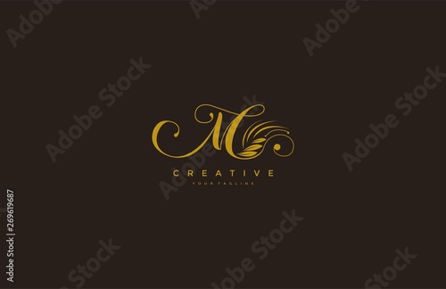 M letter luxury flourishes ornament logo