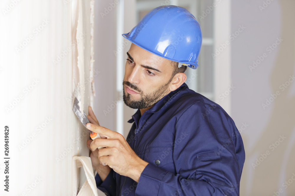 young plasterer at work