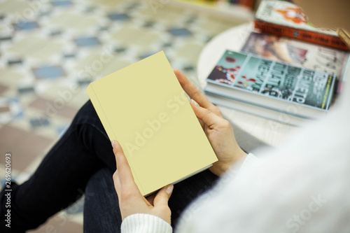 collection of various white paper on white background. a book under the library