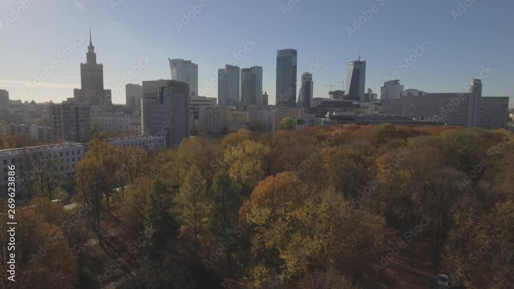 Aerial view of skyscrapers and buildings in business center in Warsaw. City skyline, day light in the winter. Wide shot. Drone shot 4k. Video format RAW. Aerial view of skyscrapers and buildings in business center in Warsaw. City skyline, day light in the winter. Wide shot. Drone shot 4k. Video format RAW.