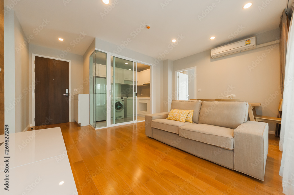 Fototapeta premium Modern living room and kitchen in small apartment