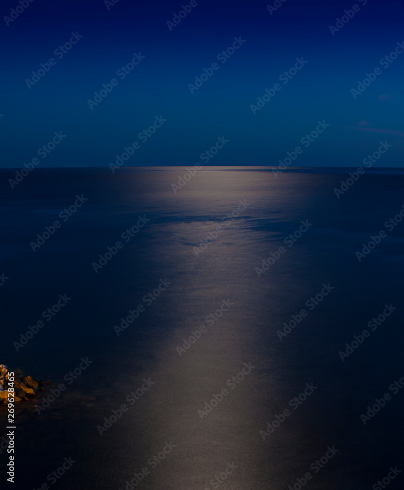 sea or ocean at night under the moon light