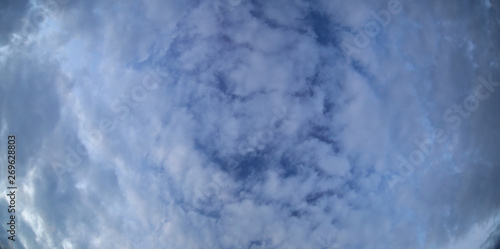 Stitched wide angle shot of altocumulus floccatus clouds