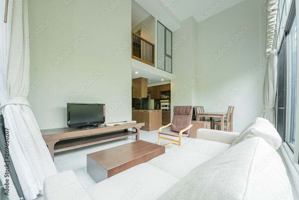 Beautiful and large living room interior with hardwood floors Beautiful and large living room interior with hardwood floors