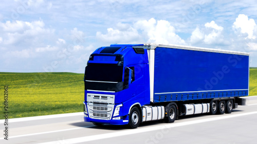 the blue truck on the road , container of road cargo transportation. Commercial transport