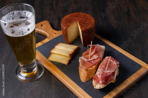 cured ham with pepper cheese and beer