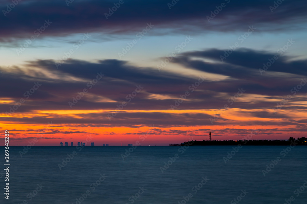 Sunrise on San Carlos Bay, Florida - Fort Myers Beach and Sanibel Island Lighthosue