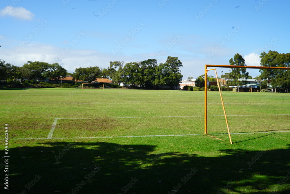 Fototapeta premium an empty park with a soccer field
