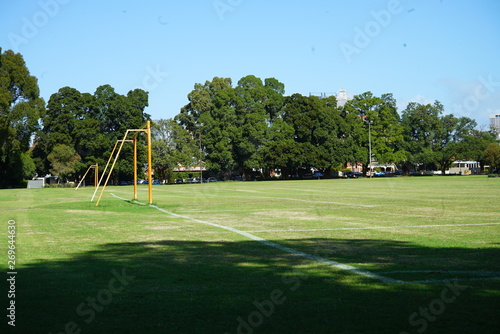 an empty park with a soccer field