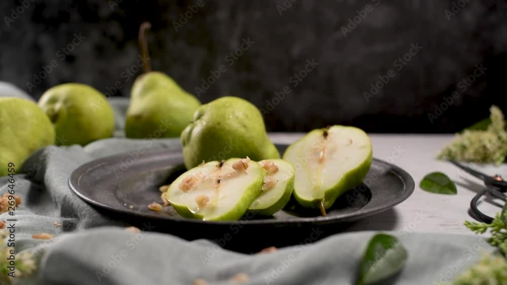 Metal plate with delicious ripe pears on table. Metal plate with delicious ripe pears on table.
