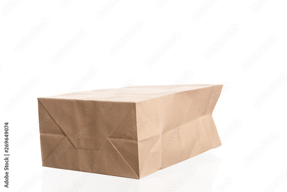 simple brown paper bag for lunch or food on white background simple brown paper bag for lunch or food on white background