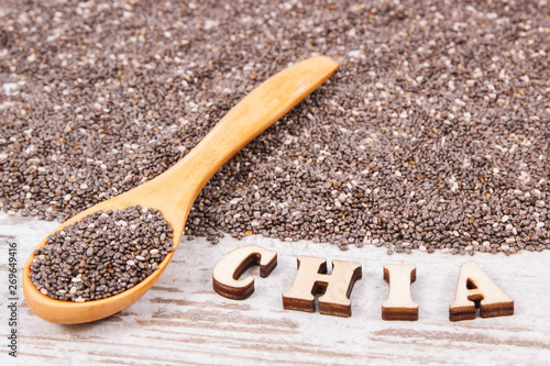 Heap of chia seeds, concept of food containing natural vitamins, fiber and minerals