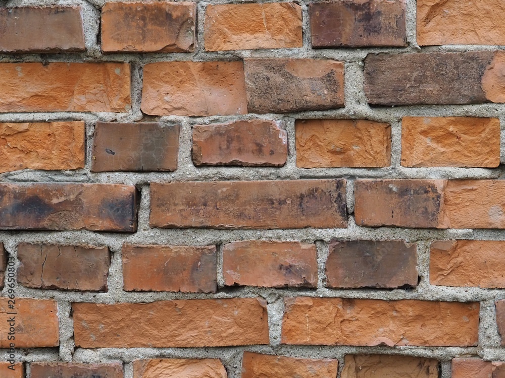 Weathered brick wall background Weathered brick wall background