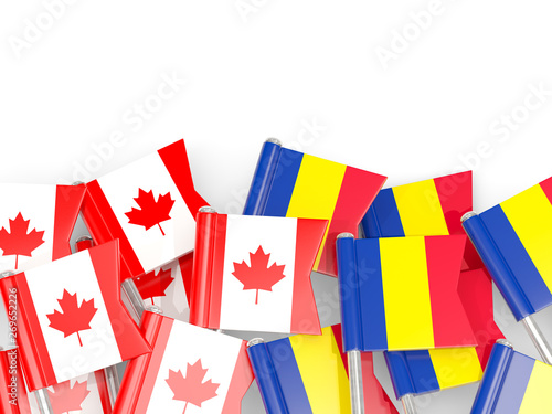 Pins with flags of Canada and romania isolated on white.