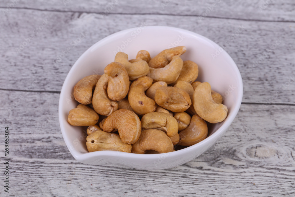 Cashew nuts heap in the bowl Cashew nuts heap in the bowl