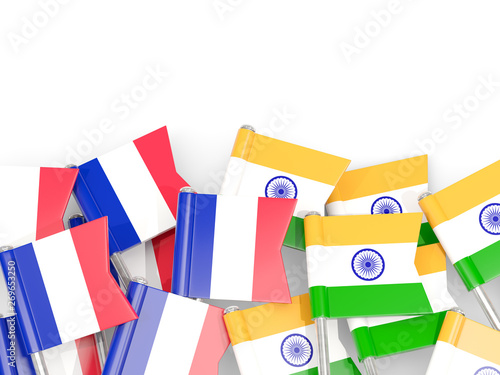 Pins with flags of France and india isolated on white.