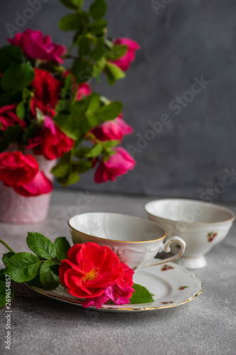 Tea set with red roses