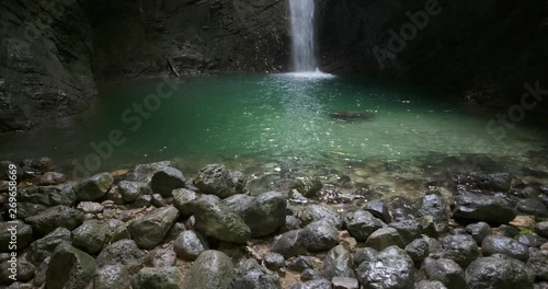 Beautiful waterfall in the cave Slap Koziak in Slovenia photo