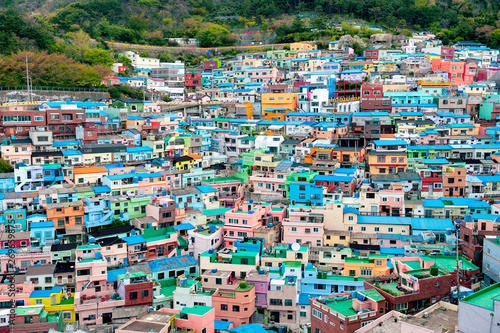 Scenic landscape of Gamcheon Culture Village, colorful and artistic tourist attraction with brightly painted houses on hillside of coastal mountain in Saha District, Busan, South Korea © jiggotravel