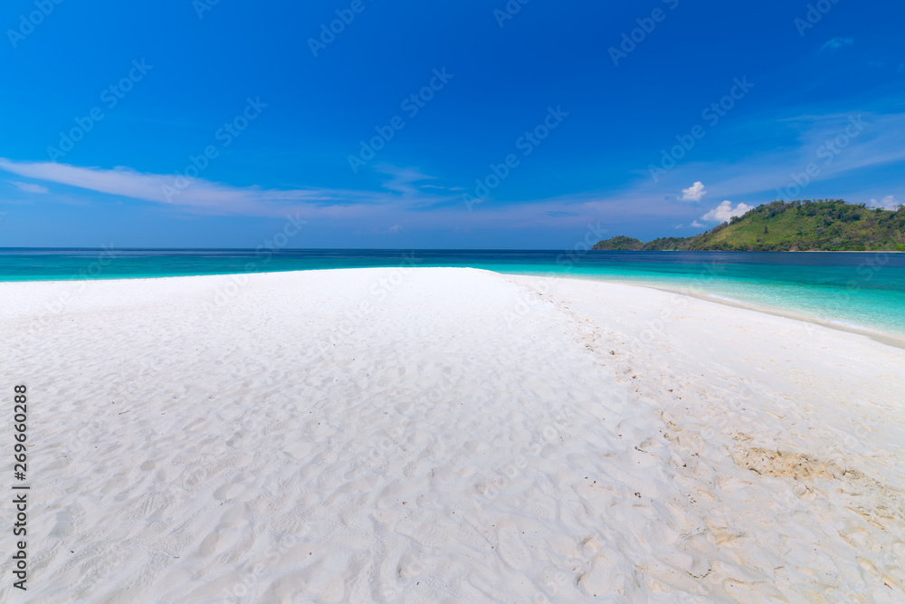 Tropical beach paradise and the blue sky at Khai Island in Satun Province , Thailand Tropical beach paradise and the blue sky at Khai Island in Satun Province , Thailand