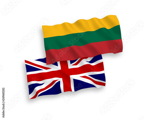 National vector fabric wave flags of Lithuania and Great Britain isolated on white background. 1 to 2 proportion.