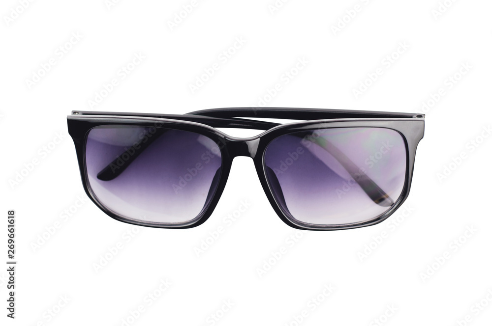 One new modern dark toned sunglasses for protection for sunlights with black plastic frame isolated on white background One new modern dark toned sunglasses for protection for sunlights with black plastic frame isolated on white background