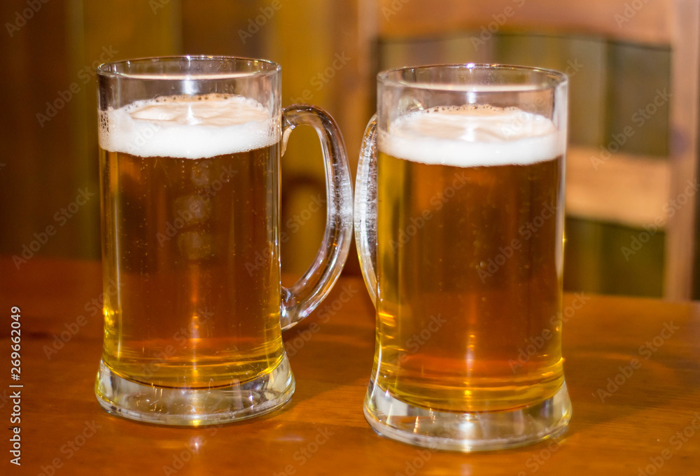 two glasses of beer lager two glasses of beer lager