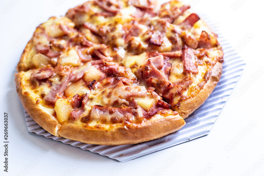 pizza hawaiian with ham cheese close up
