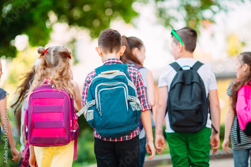 Group of kids going to school together.