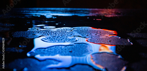 Wet asphalt, night scene of...
