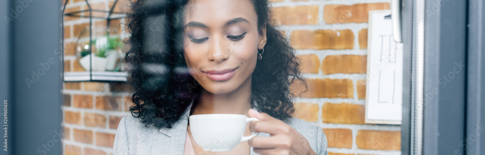 custom made wallpaper toronto digitalpanoramic shot of african american Casual businesswoman with coffee cup behind window