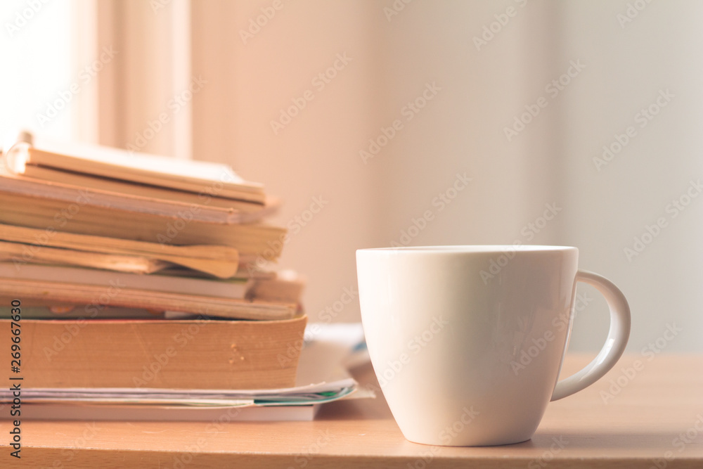 Cup of coffee with stack document on office desk.Copy space. Cup of coffee with stack document on office desk.Copy space.