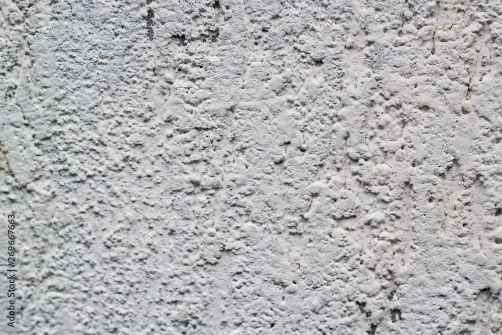 White bits texture on a concrete wall