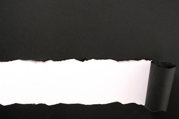 Torn black paper strip white background straight