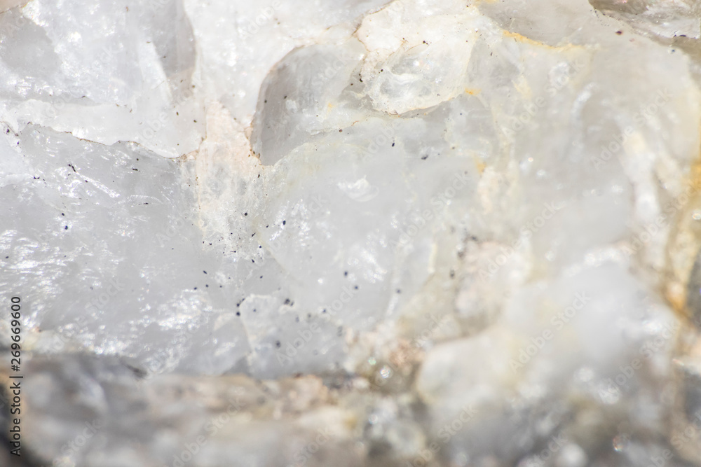 White quartz rock full of details and cracks White quartz rock full of details and cracks